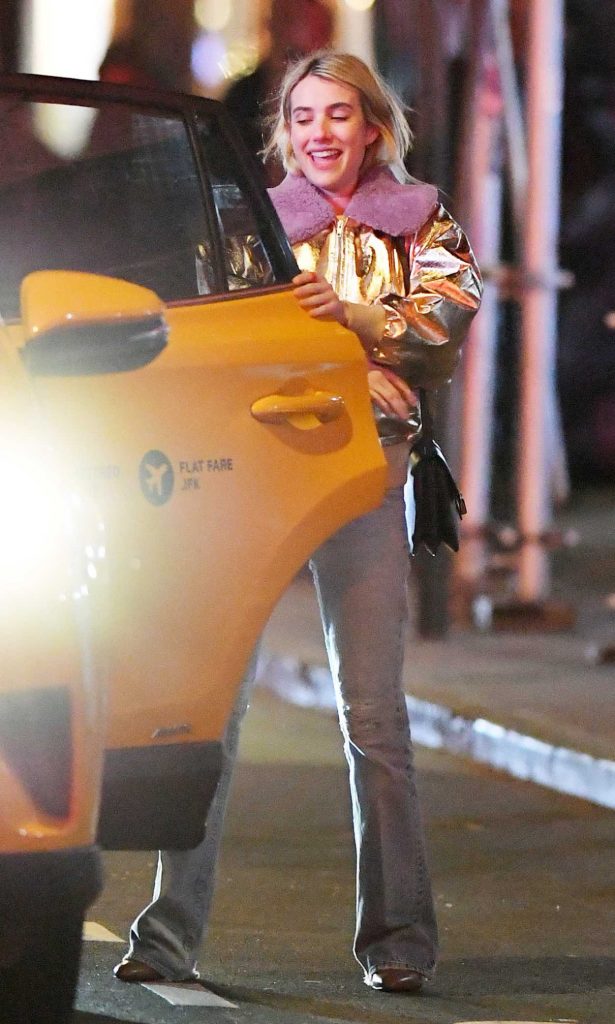 Emma Roberts in a Gold Jacket