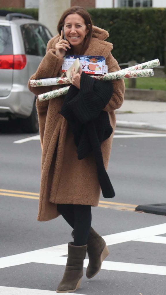 Gabby Karan in a Tan Faux Fur Coat