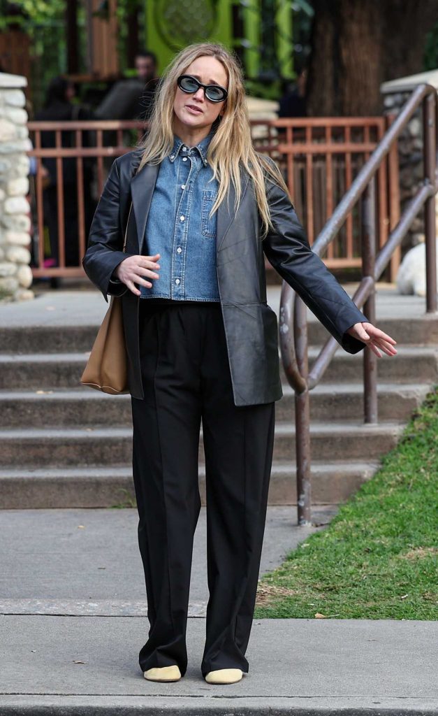 Jennifer Lawrence in a Black Leather Blazer