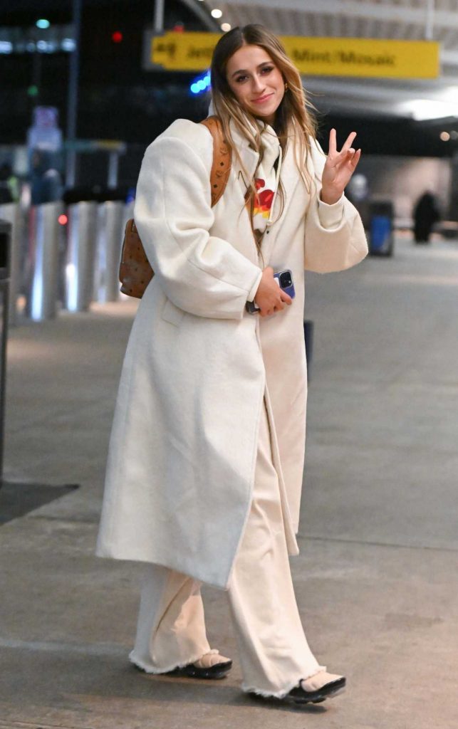 Tate McRae in a White Coat