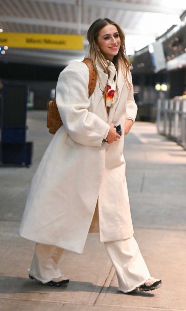 Tate McRae in a White Coat