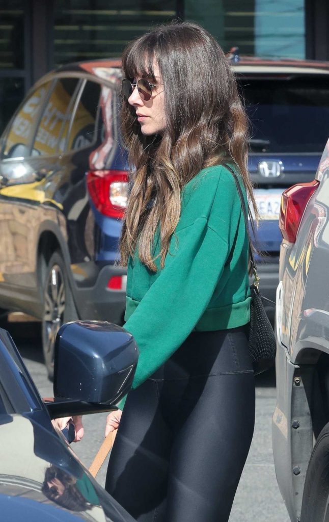 Alison Brie in a Green Sweatshirt