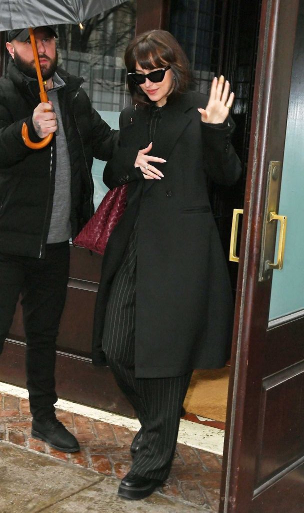 Dakota Johnson in a Black Coat
