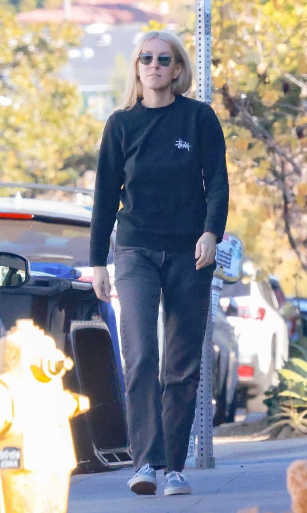 Dylan Meyer in a Black Sweatshirt