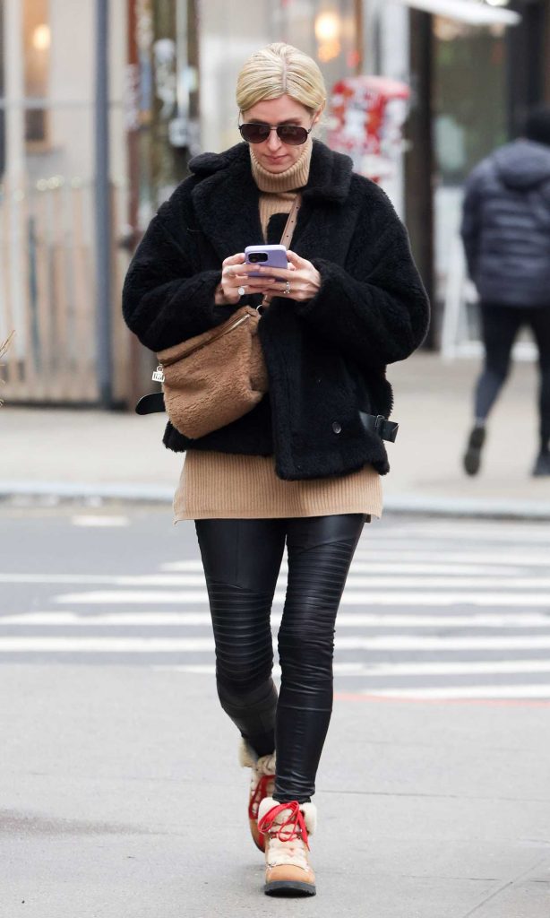 Nicky Hilton in a Black Fur Jacket