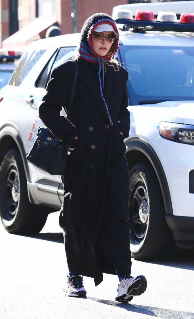 Rita Ora in a Black Coat