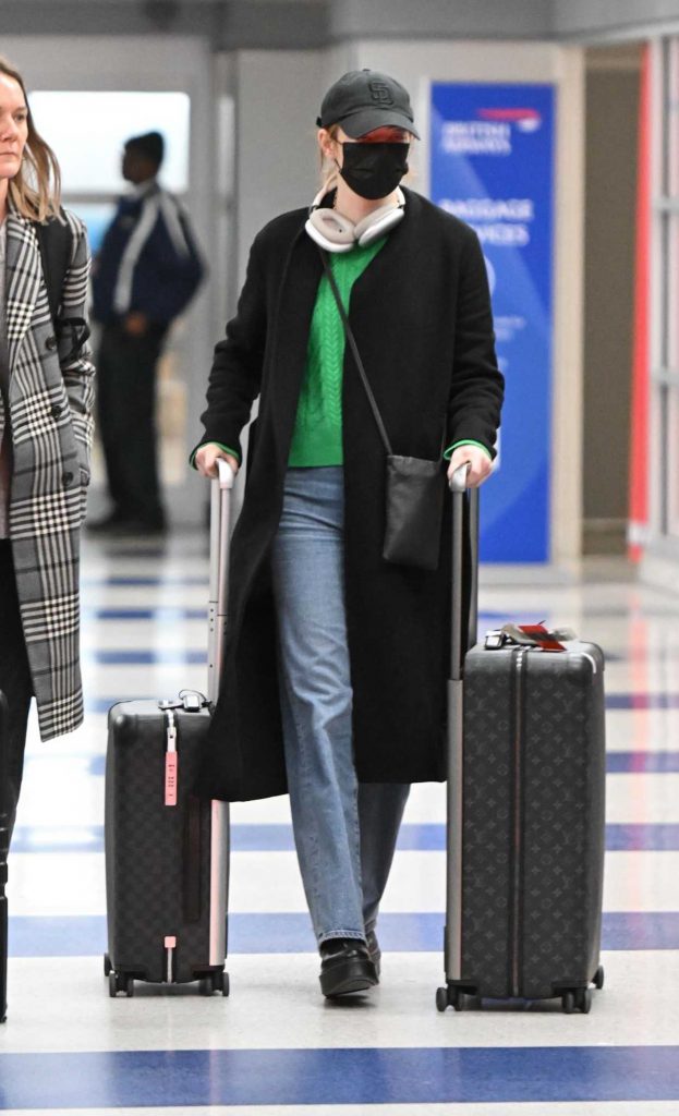 Emma Stone in a Black Cap