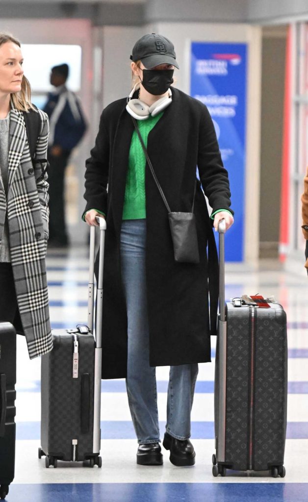 Emma Stone in a Black Cap
