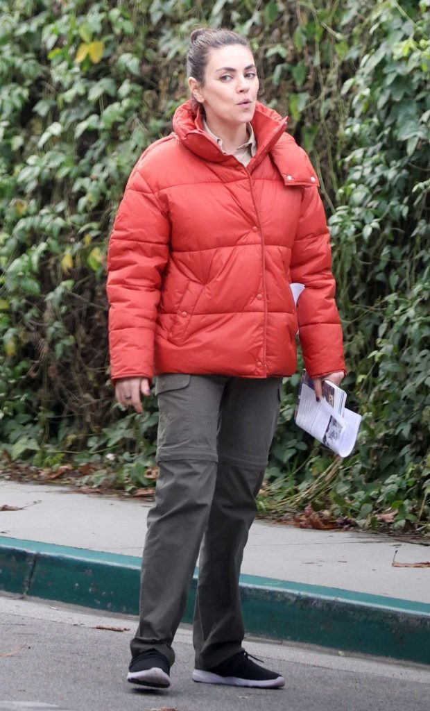 Mila Kunis in a Red Puffer Jacket