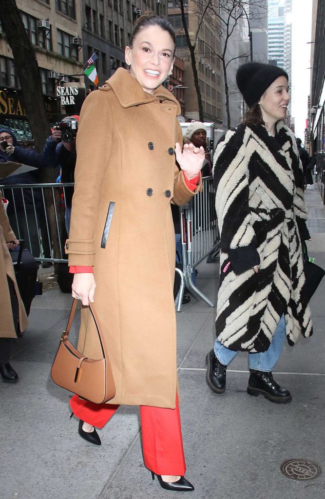 Sutton Foster in a Caramel Coloured Coat