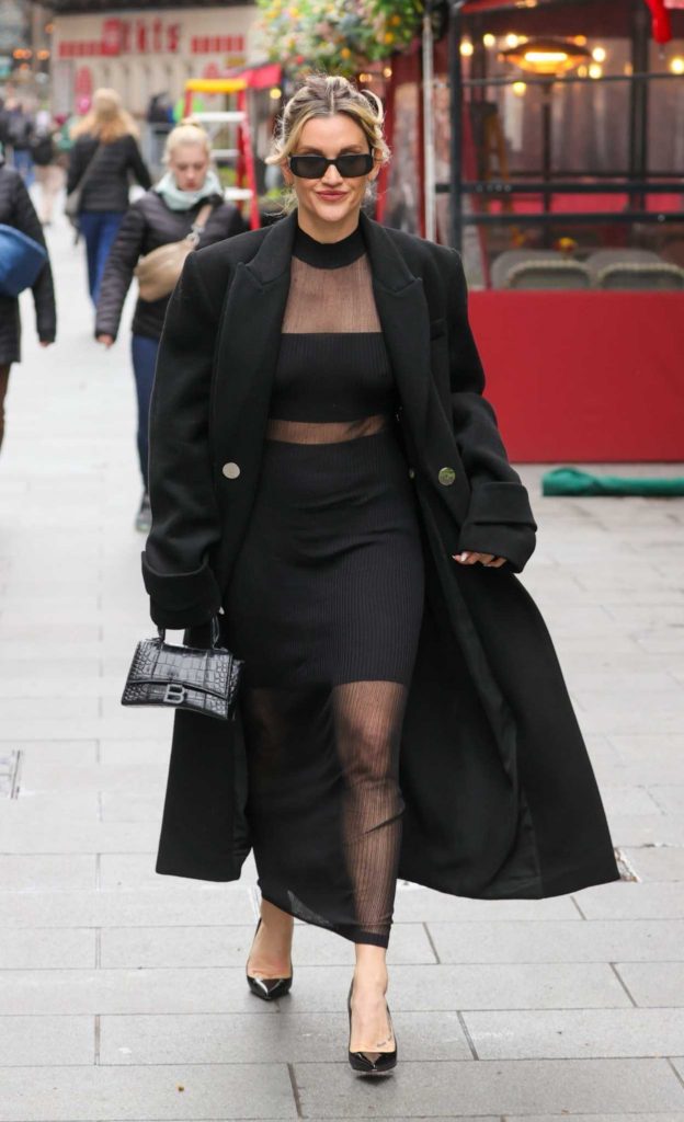 Ashley Roberts in a Black Leather Coat