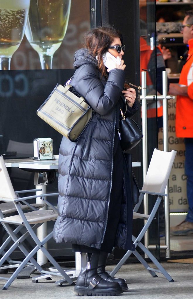 Cristina D'Avena in a Black Puffer Coat