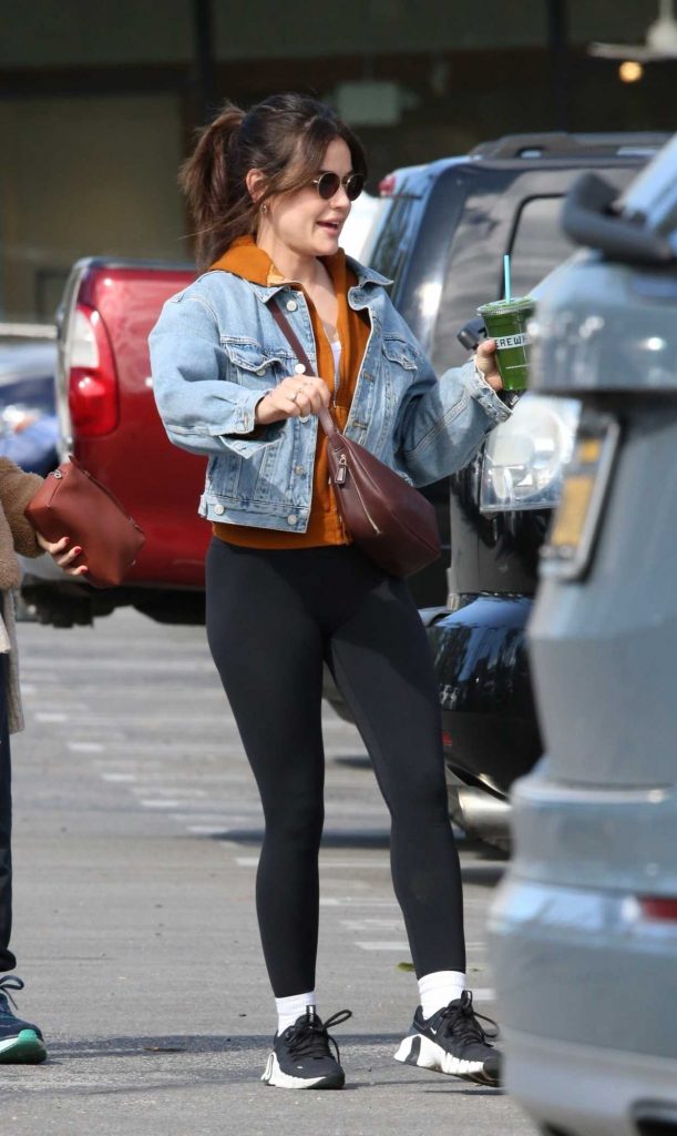 Lucy Hale in a Black Sneakers