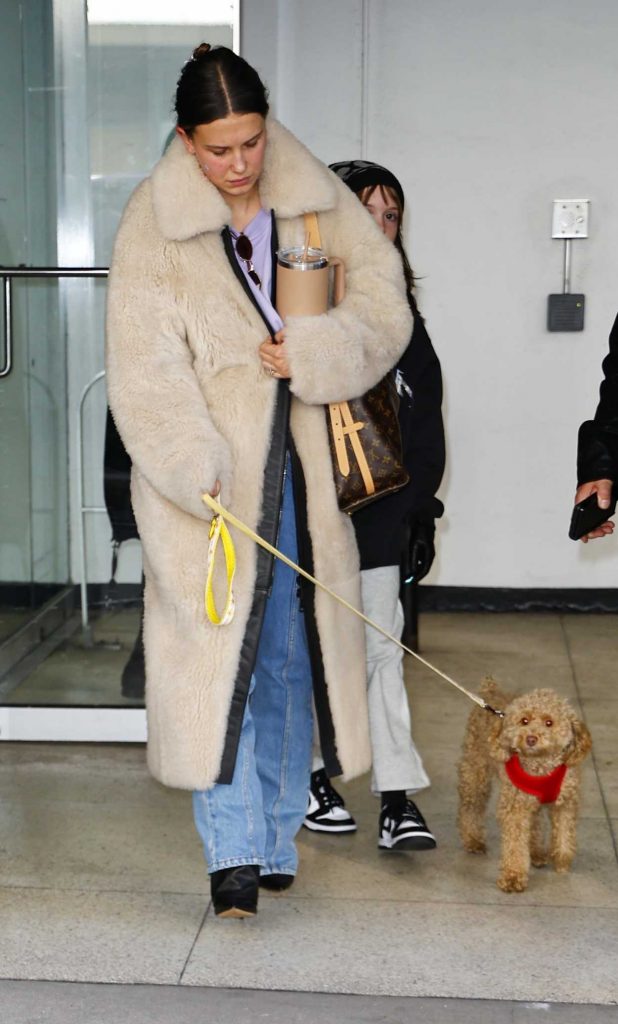 Millie Bobby Brown in a Beige Fur Coat