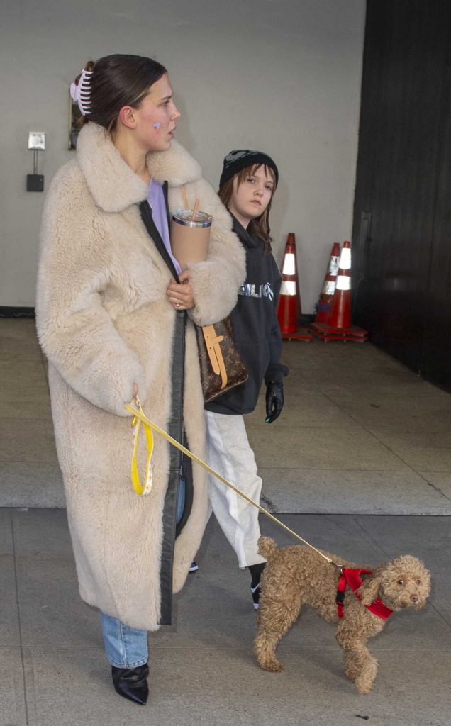 Millie Bobby Brown in a Beige Fur Coat