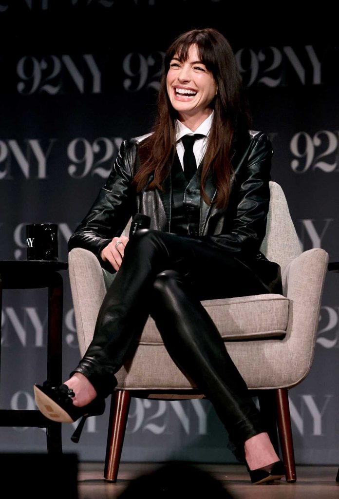 Anne Hathaway in a Black Leather Suit