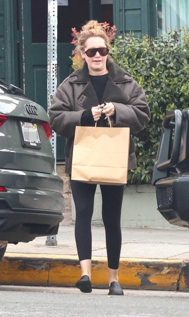 Ashley Tisdale in a Black Leggings