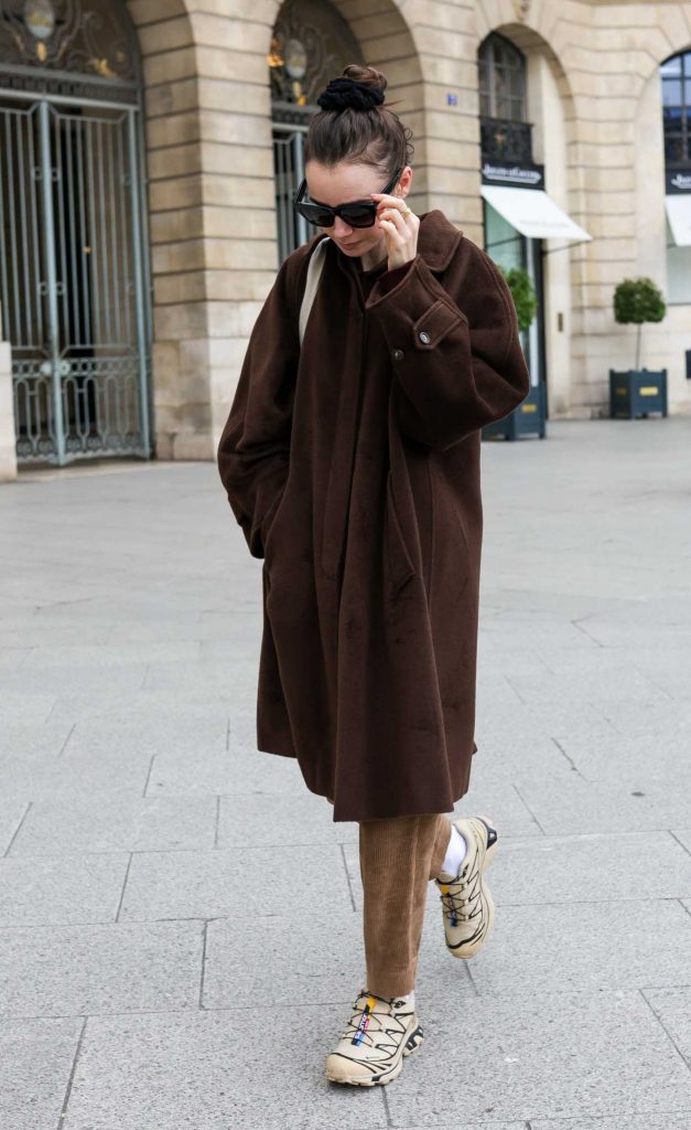Lily Collins in a Brown Coat