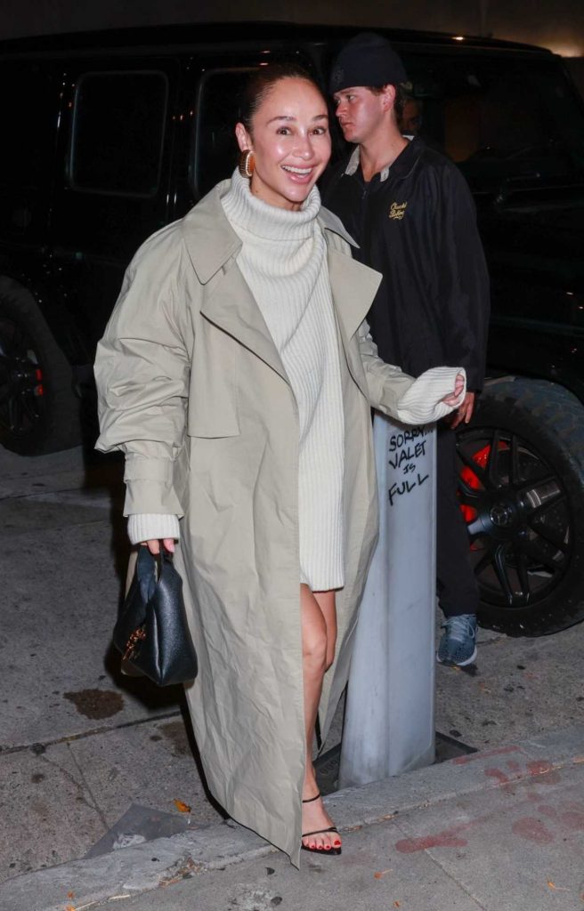 Cara Santana in a Beige Trench Coat