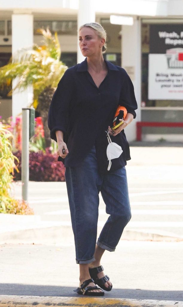 Charlize Theron in a Blue Shirt