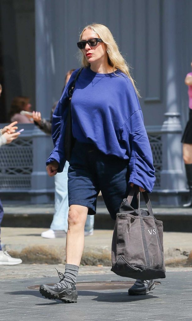 Chloe Sevigny in a Blue Oversized Sweatshirt