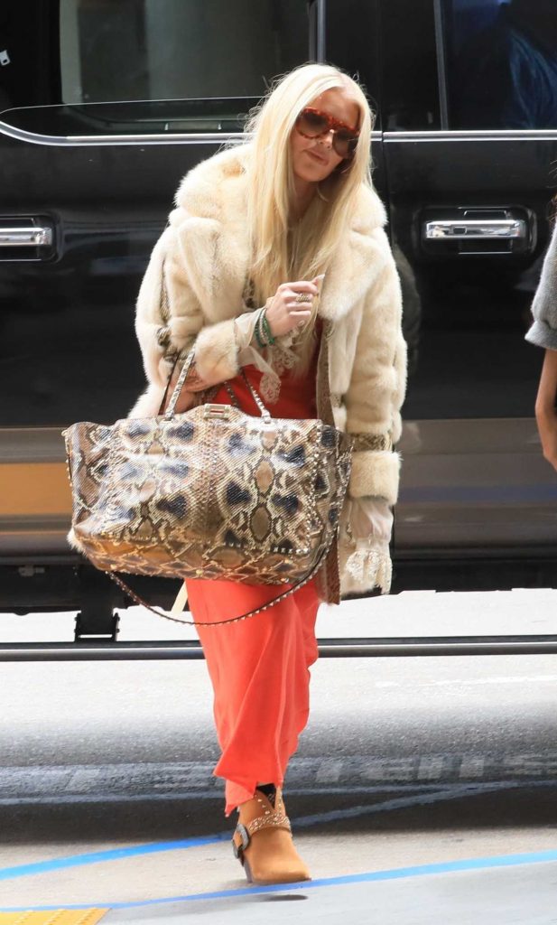 Jessica Simpson in a Vintage Faux Fur Coat