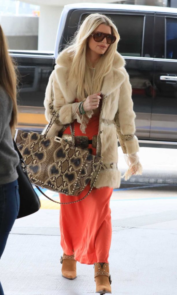 Jessica Simpson in a Vintage Faux Fur Coat