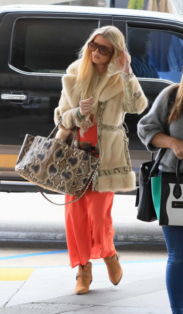 Jessica Simpson in a Vintage Faux Fur Coat