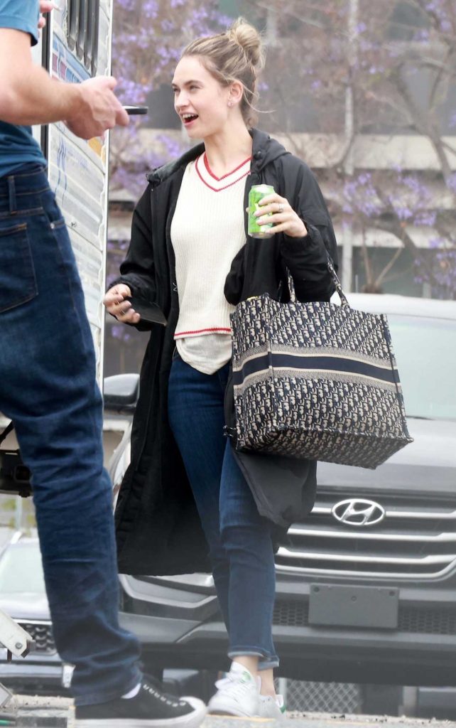 Lily James in a White Sneakers