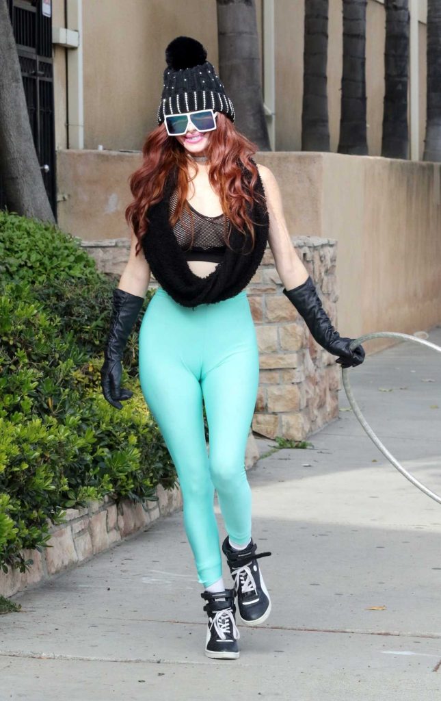 Phoebe Price in a Turquoise Leggings