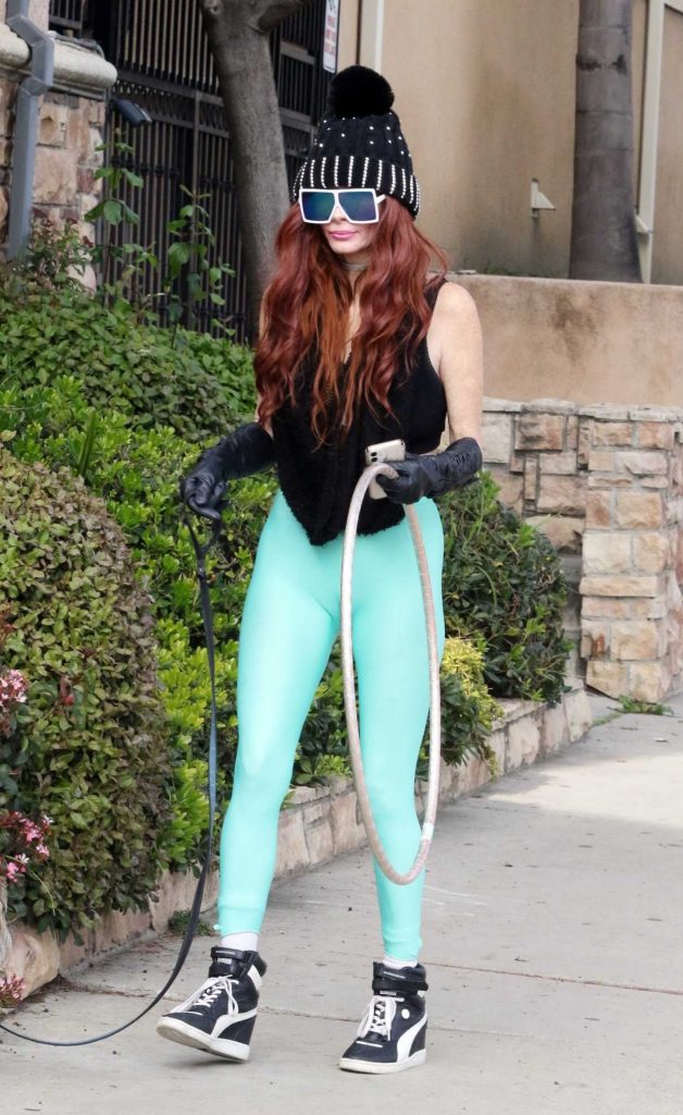 Phoebe Price in a Turquoise Leggings