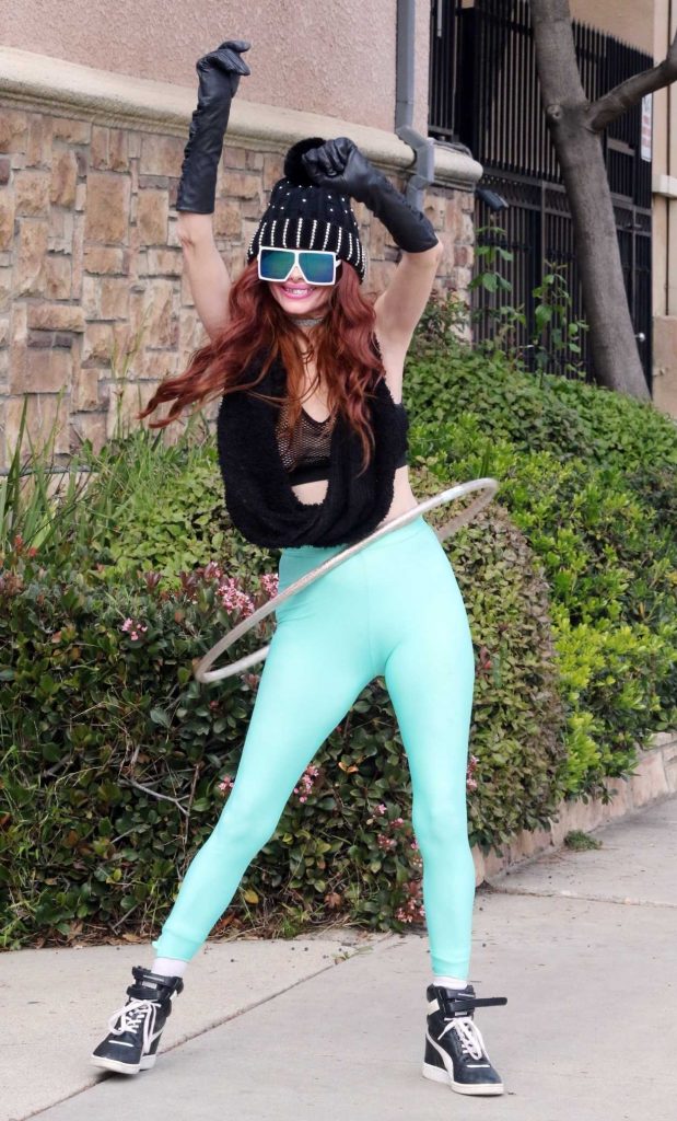 Phoebe Price in a Turquoise Leggings