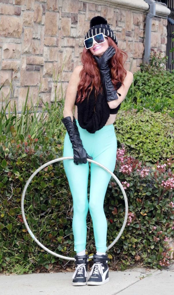 Phoebe Price in a Turquoise Leggings