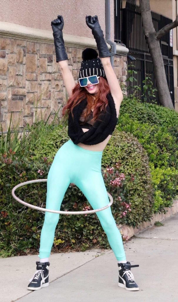 Phoebe Price in a Turquoise Leggings