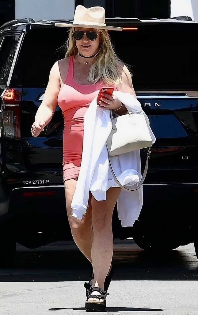 Britney Spears in a Form Fitting Red Mini Dress