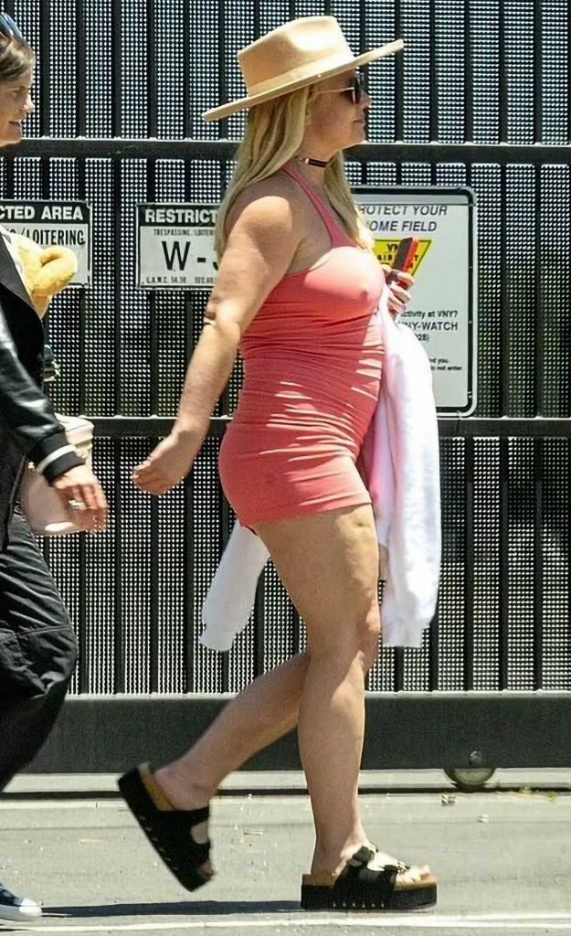 Britney Spears in a Form Fitting Red Mini Dress