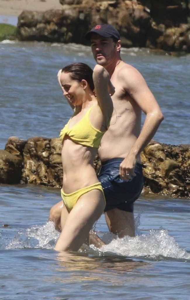 Dakota Johnson in a Yellow Bikini