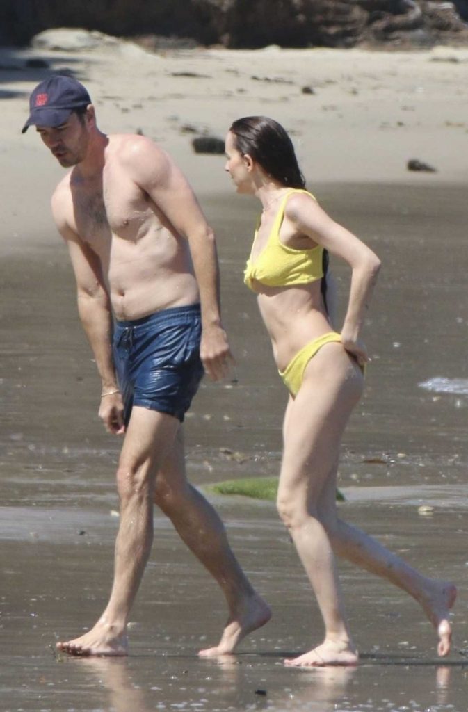 Dakota Johnson in a Yellow Bikini