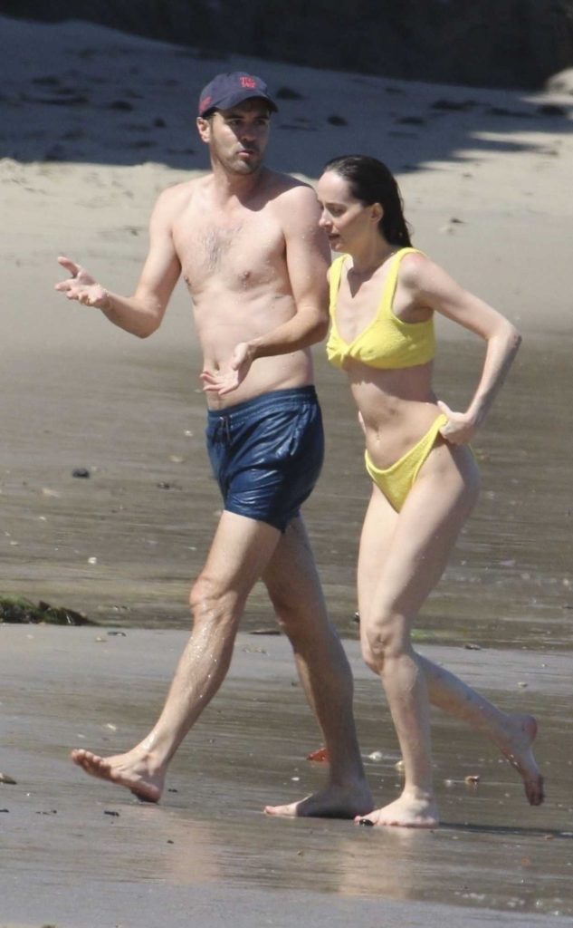 Dakota Johnson in a Yellow Bikini