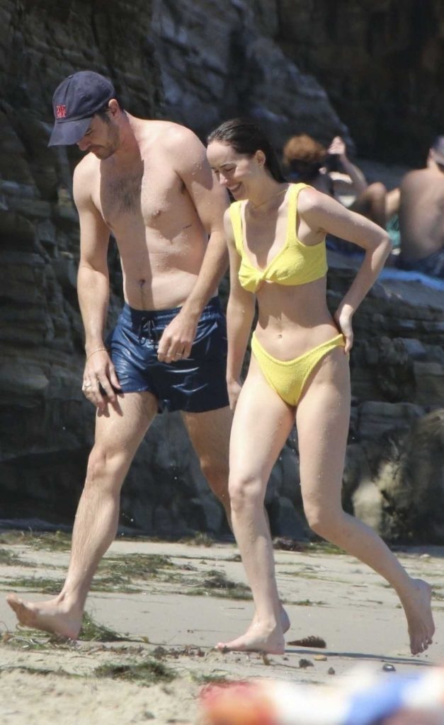 Dakota Johnson in a Yellow Bikini