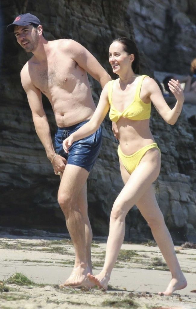 Dakota Johnson in a Yellow Bikini