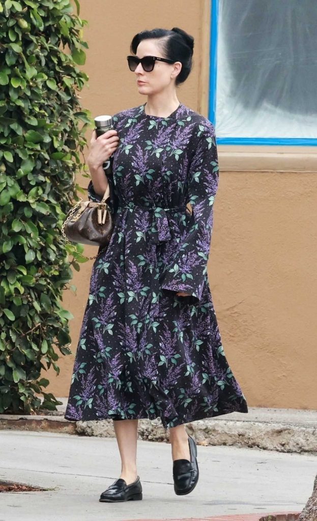Dita Von Teese in a Black Floral Dress