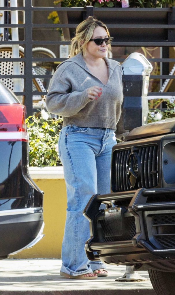 Hilary Duff in a Grey Sweater