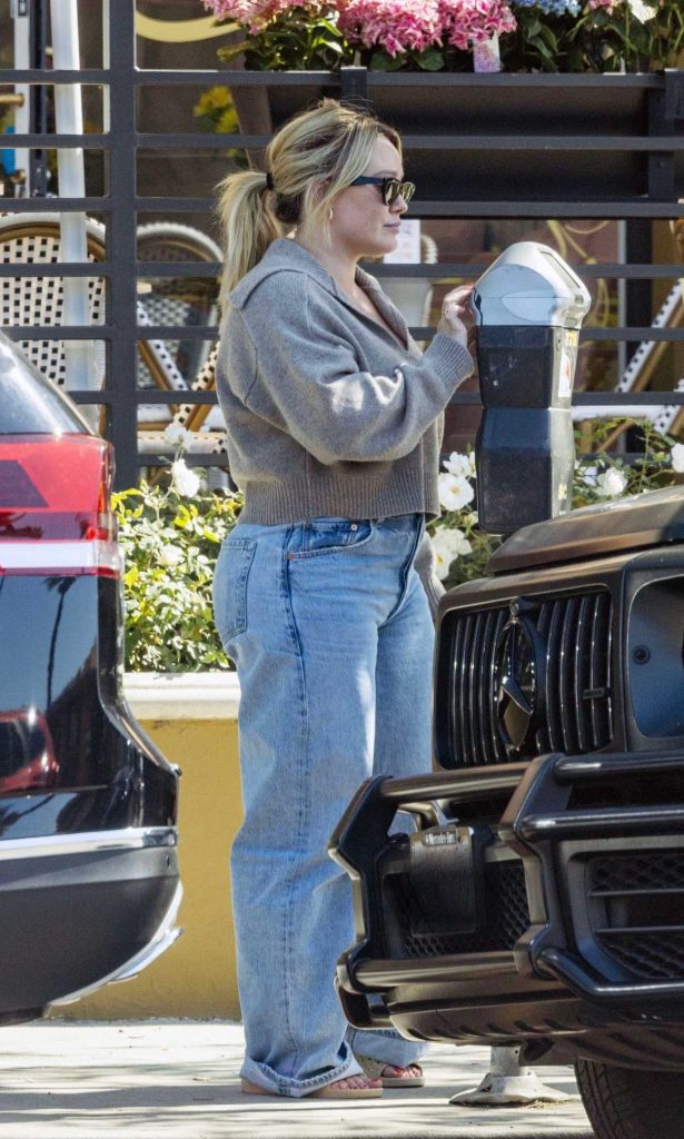 Hilary Duff in a Grey Sweater