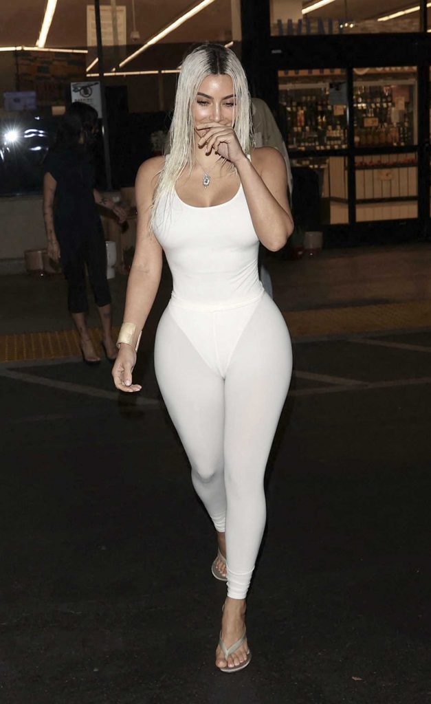 Kim Kardashian in a White Bodysuit