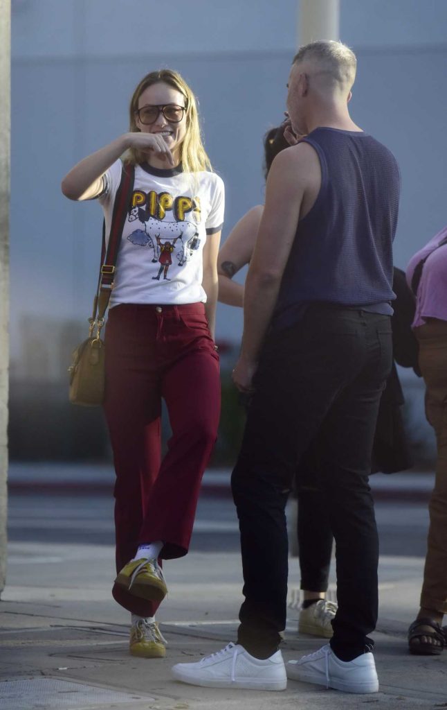 Olivia Wilde in a Yellow Adidas Sneakers