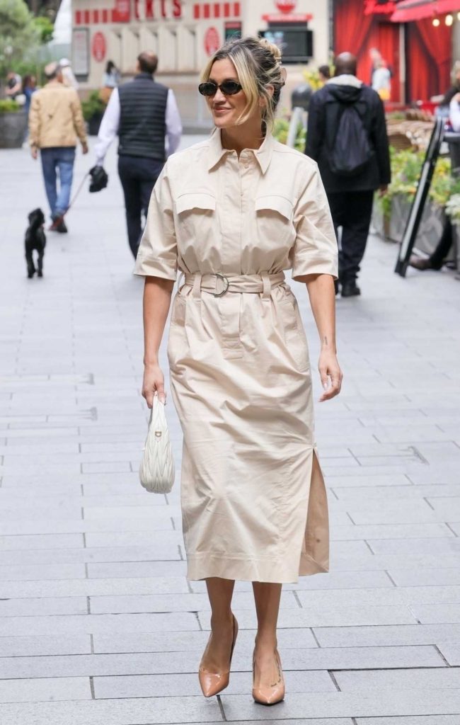 Ashley Roberts in a Beige Dress