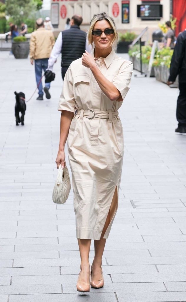 Ashley Roberts in a Beige Dress