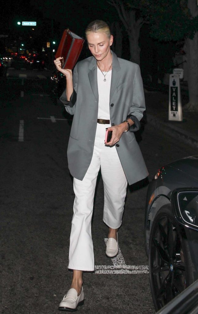 Charlize Theron in a Grey Blazer