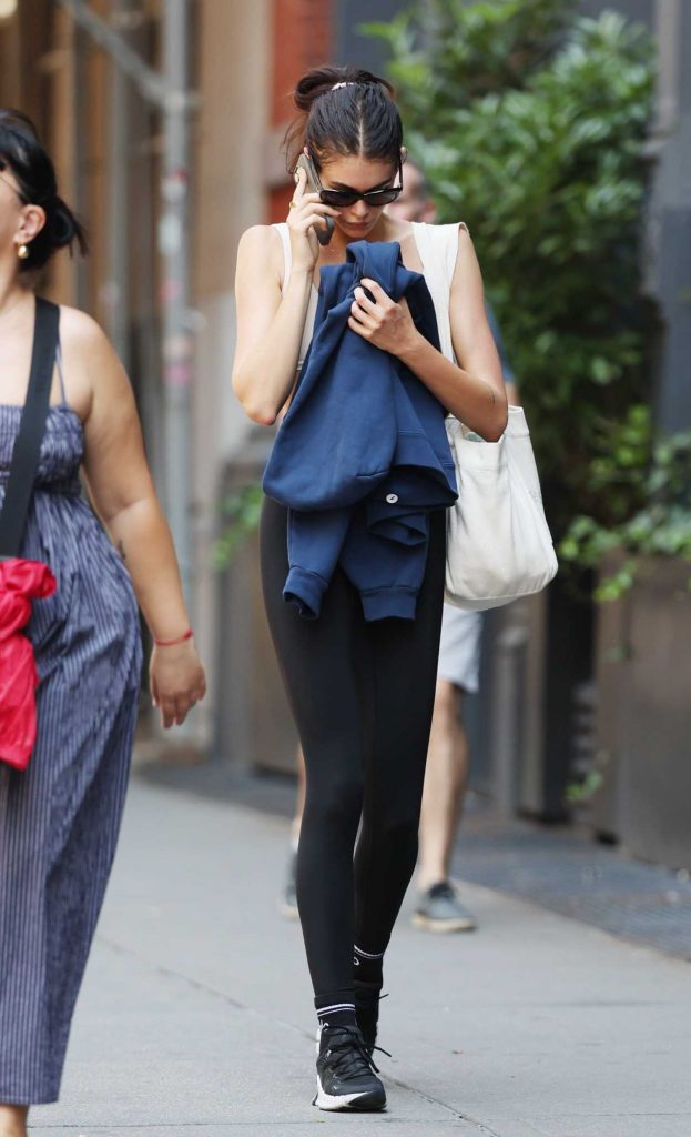 Kaia Gerber in a Black Sneakers